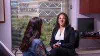 Dr. Cassandra Simmons speaking with a patient